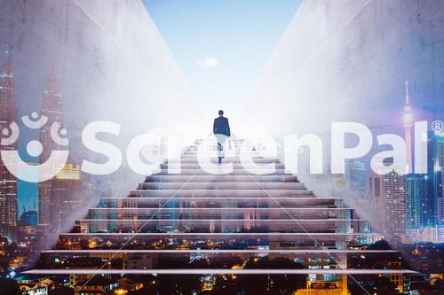 Rear View Of A Businessman Climbing Stairs To Get To A Large City Center. Concept Of Success And Appreciation. Double Exposure